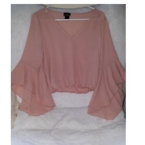 pink cropped shirt